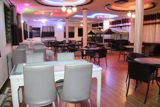 Horyaal Hotel restaurant in the evening under coloured lighting